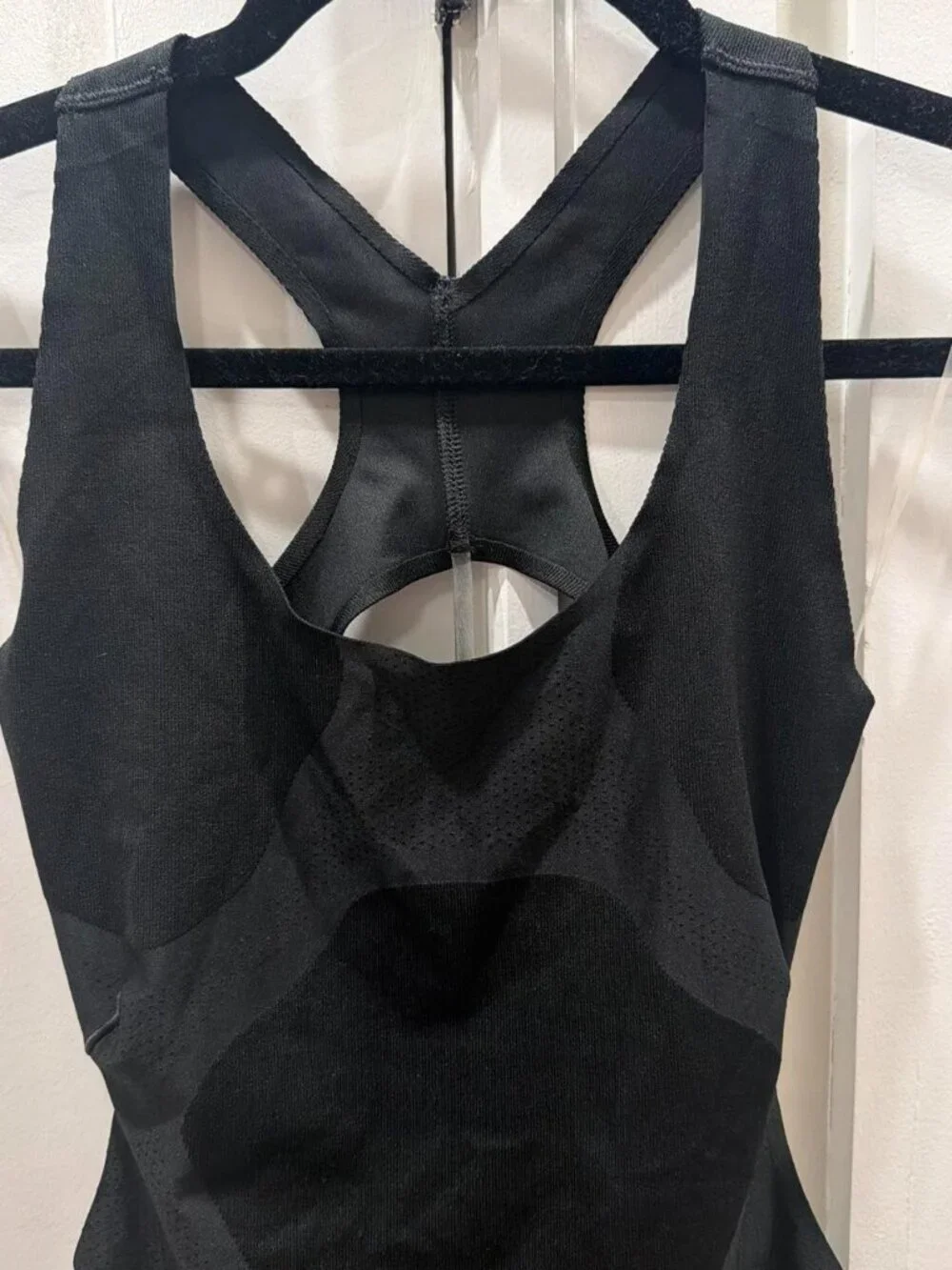 Nike black running bodysuit with cutout detail